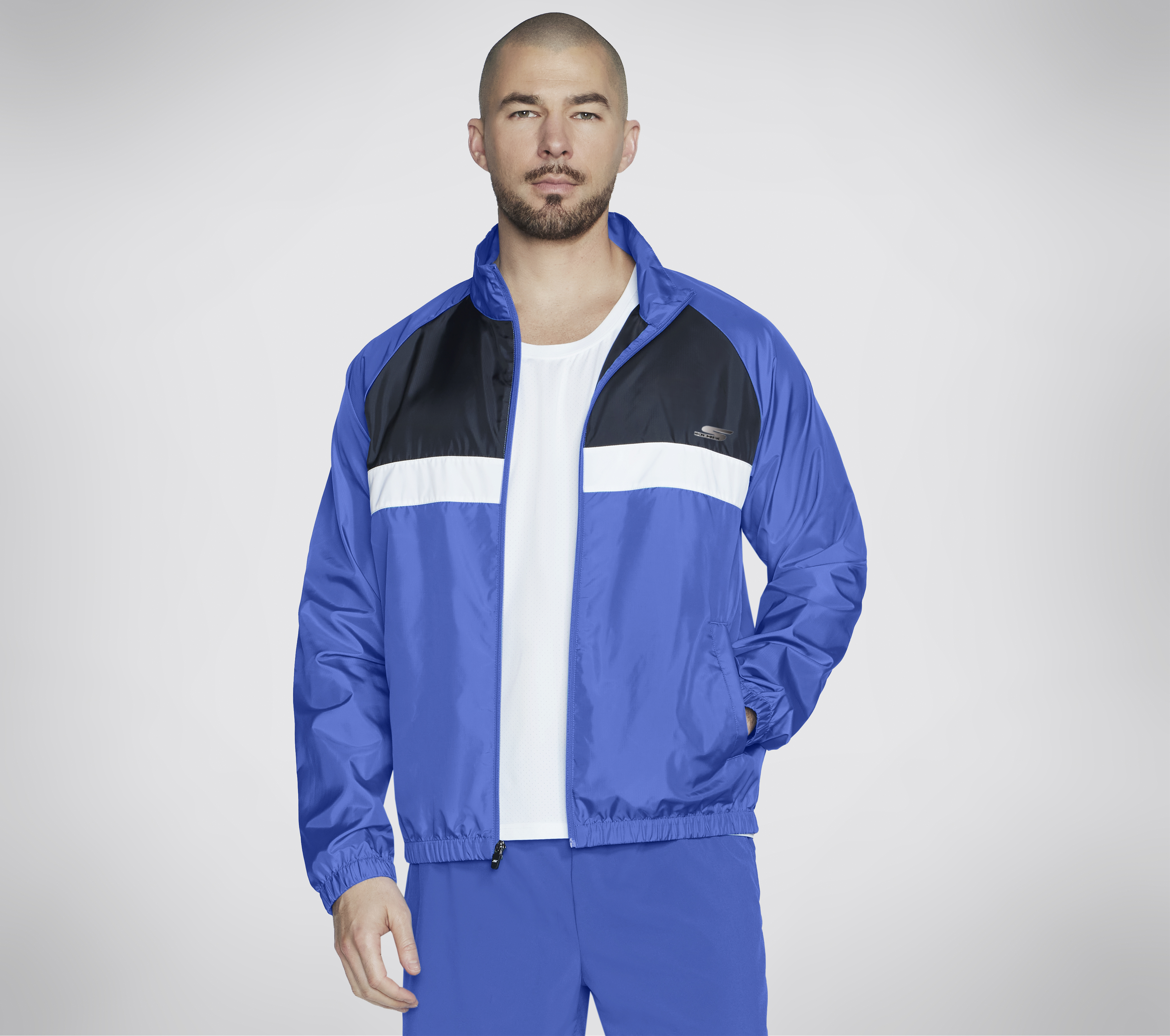 Skechers Speed Elite Track Jacke in Blau/Grün, Größe 2XL